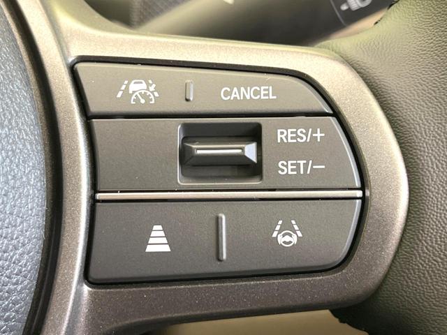 フリード ｅ：ＨＥＶエアー　ＥＸ　登録済未使用車　両側電動スライドドア　アダプティブクルーズコントロール　前席シートヒーター　ＬＥＤヘッドライト　スマートキー　オートライト　オートエアコン　ブラインドスポットモニター（4枚目）