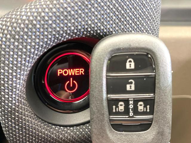 フリード ｅ：ＨＥＶエアー　ＥＸ　登録済未使用車　両側電動スライドドア　アダプティブクルーズコントロール　前席シートヒーター　ＬＥＤヘッドライト　スマートキー　オートライト　オートエアコン　ブラインドスポットモニター（7枚目）