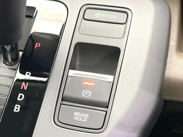 フリード ｅ：ＨＥＶエアー　ＥＸ　登録済未使用車　両側電動スライドドア　アダプティブクルーズコントロール　前席シートヒーター　ＬＥＤヘッドライト　スマートキー　オートライト　オートエアコン　ブラインドスポットモニター（46枚目）