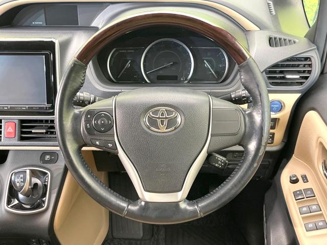 ノア ハイブリッドＧ　両側電動ドア　純正９型ナビ　バックカメラ　禁煙車　スマートキー　ＬＥＤヘッド　ビルトインＥＴＣ　クルコン　純正１５インチアルミ　オートライト　デュアルエアコン　Ｂｌｕｅｔｏｏｔｈ　ＣＤ　ＤＶＤ再生（12枚目）
