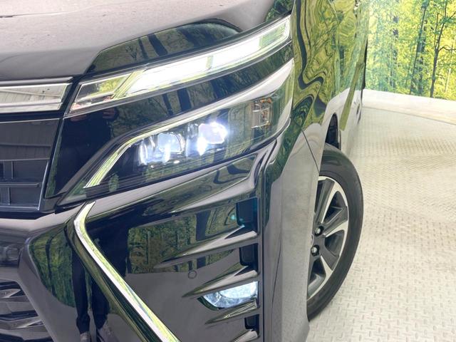 ヴォクシー ＺＳ　煌ＩＩＩ　両側電動ドア　１０型ＳＤナビ　後席モニター　バックカメラ　衝突被害軽減システム　禁煙車　ハーフレザーシート　ドラレコ　コーナーセンサー　スマートキー　ＬＥＤヘッド　ＨＩＤヘッド　ＥＴＣ２．０　クルコン（12枚目）