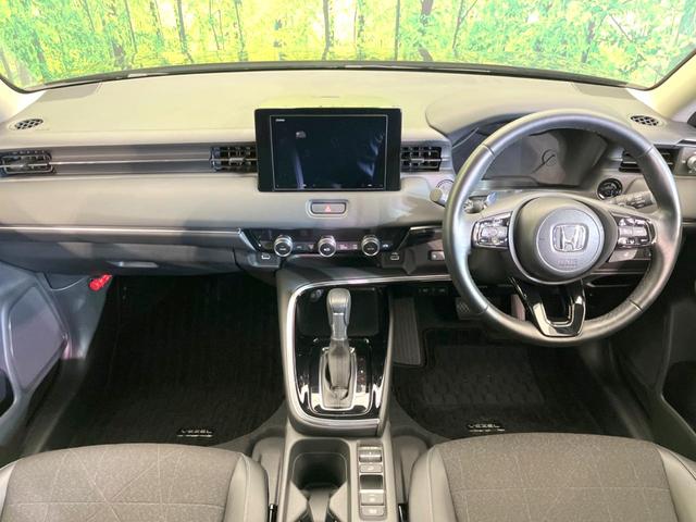 ヴェゼル e:HEV Z バックカメラ 衝突被害軽減システム レーダークルーズ 禁煙車 電動リアゲート ハーフレザーシート ドラレコ コーナーセンサー スマートキー LEDヘッド ビルトインETC 純正18インチアルミ(2枚目)