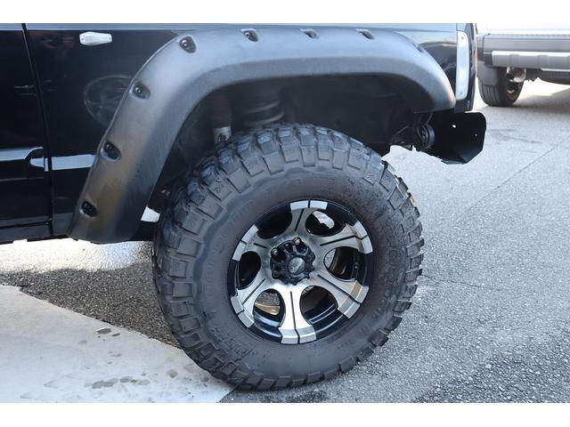 ジープ・チェロキー リミテッド　リフトアップ　１８インチＡＷ＆Ｍ／Ｔタイヤ　社外オーバーフェンダー　赤／白テール　パナソニック２ＤＩＮナビ＆バックカメラ　前後ドラレコ　ＥＴＣ　バイパーキーレス　エンジンルームＰＣＭリビルト済　下取（19枚目）