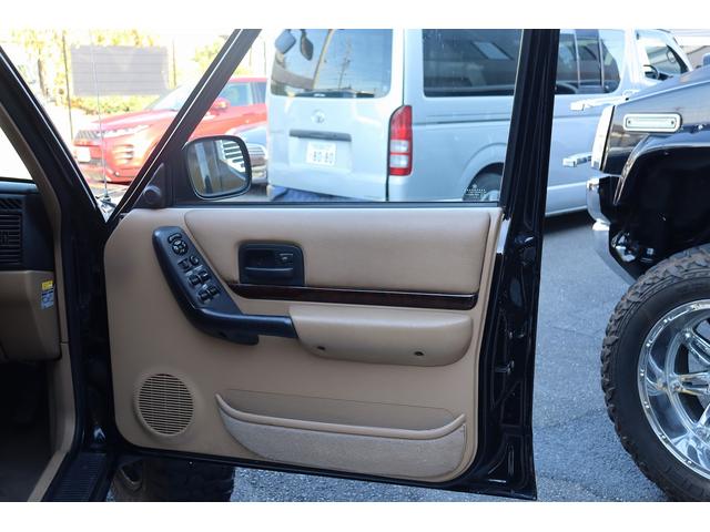 ジープ・チェロキー リミテッド　リフトアップ　１８インチＡＷ＆Ｍ／Ｔタイヤ　社外オーバーフェンダー　赤／白テール　パナソニック２ＤＩＮナビ＆バックカメラ　前後ドラレコ　ＥＴＣ　バイパーキーレス　エンジンルームＰＣＭリビルト済　下取（36枚目）