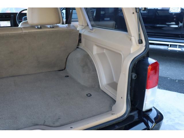 ジープ・チェロキー リミテッド　リフトアップ　１８インチＡＷ＆Ｍ／Ｔタイヤ　社外オーバーフェンダー　赤／白テール　パナソニック２ＤＩＮナビ＆バックカメラ　前後ドラレコ　ＥＴＣ　バイパーキーレス　エンジンルームＰＣＭリビルト済　下取（45枚目）