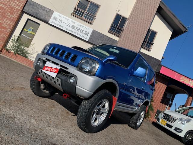 ジムニー ＦＩＳフリースタイルワールドカップリミテッド　ターボ　４ＷＤ　リフトアップ　社外アルミホイール　タイミングチェーン式　車検２年（4枚目）