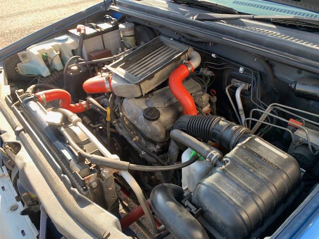 ジムニー ＦＩＳフリースタイルワールドカップリミテッド　ターボ　４ＷＤ　リフトアップ　社外アルミホイール　タイミングチェーン式　車検２年（17枚目）