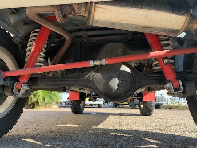 ジムニー ＦＩＳフリースタイルワールドカップリミテッド　ターボ　４ＷＤ　リフトアップ　社外アルミホイール　タイミングチェーン式　車検２年（19枚目）