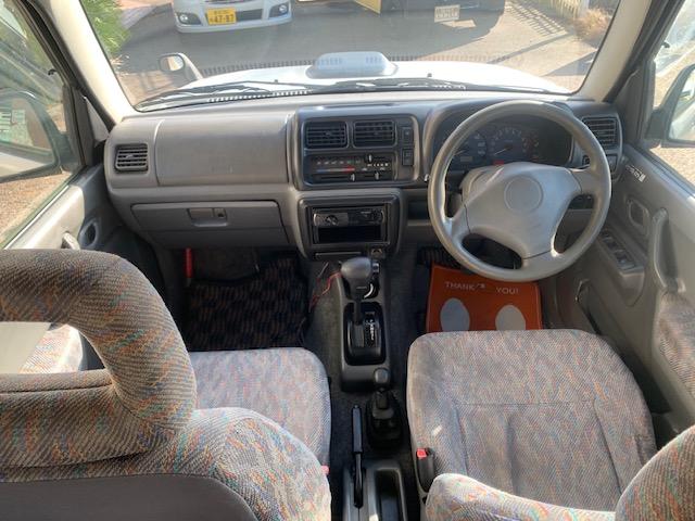 ジムニー ＸＣ　リフトアップ　ターボ　４ＷＤ　ブースト計　社外アルミホイール　タイミングチェーン式　車検２年（11枚目）
