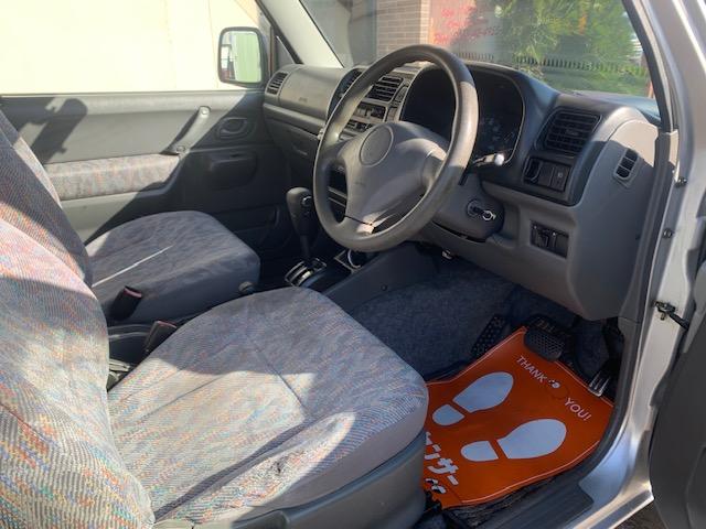 ジムニー ＸＣ　リフトアップ　ターボ　４ＷＤ　ブースト計　社外アルミホイール　タイミングチェーン式　車検２年（12枚目）