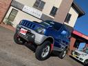 ジムニー ＦＩＳフリースタイルワールドカップリミテッド　ターボ　４ＷＤ　リフトアップ　社外アルミホイール　タイミングチェーン式　車検２年（4枚目）