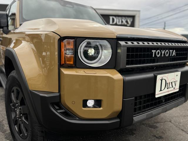 ランドクルーザー250 ZX JBLサウンド 丸目ヘッドライト ムーンルーフ ルーフレール パノラミックビューモニター フルセグTV 純正12.3型ナビ デジタルインナーミラー シートエアコン 電動格納サードシート ワイヤレス充電(9枚目)