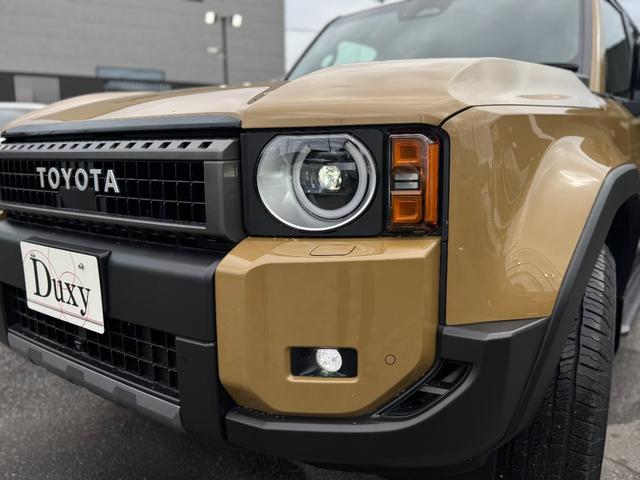 ランドクルーザー250 ZX JBLサウンド 丸目ヘッドライト ムーンルーフ ルーフレール パノラミックビューモニター フルセグTV 純正12.3型ナビ デジタルインナーミラー シートエアコン 電動格納サードシート ワイヤレス充電(12枚目)