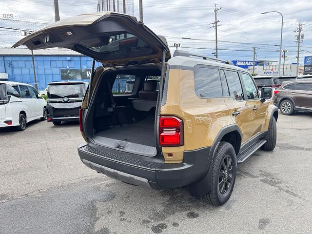 ランドクルーザー250 ZX JBLサウンド 丸目ヘッドライト ムーンルーフ ルーフレール パノラミックビューモニター フルセグTV 純正12.3型ナビ デジタルインナーミラー シートエアコン 電動格納サードシート ワイヤレス充電(70枚目)