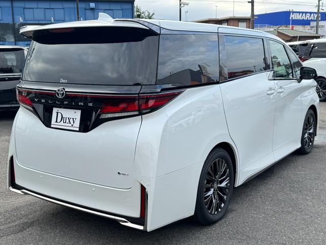 ヴェルファイアハイブリッド Ｚ　プレミア　１３．２型後席モニター　寒冷地仕様　左右独立ムーンルーフ　ヘッドアップディスプレイ　デジタルインナーミラー　左右独立ムーンルーフ　パノラミックビューモニタ　ブラインドスポットモニター　インテリアイルミ（18枚目）