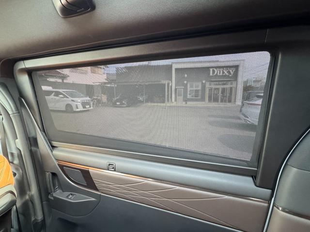 ヴェルファイアハイブリッド Ｚ　プレミア　１３．２型後席モニター　寒冷地仕様　左右独立ムーンルーフ　ヘッドアップディスプレイ　デジタルインナーミラー　左右独立ムーンルーフ　パノラミックビューモニタ　ブラインドスポットモニター　インテリアイルミ（66枚目）