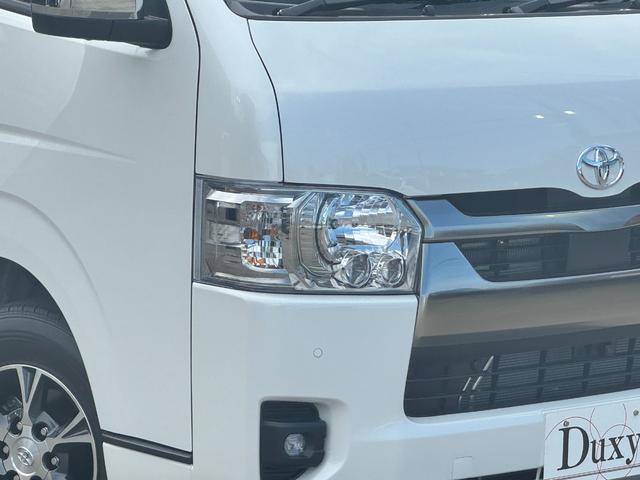ハイエースバン ロングスーパーGL ダークプライムS 純正アルミホール パノラミックビューモニターカメラ デジタルインナーミラー フロントドアスカフプレート LEDヘッド 両側電動パワースライド アクセサリーコンセント フェンダーミラー 特別仕様車(5枚目)