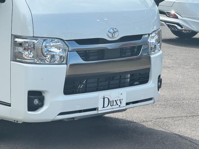 ハイエースバン ロングスーパーGL ダークプライムS 純正アルミホール パノラミックビューモニターカメラ デジタルインナーミラー フロントドアスカフプレート LEDヘッド 両側電動パワースライド アクセサリーコンセント フェンダーミラー 特別仕様車(7枚目)