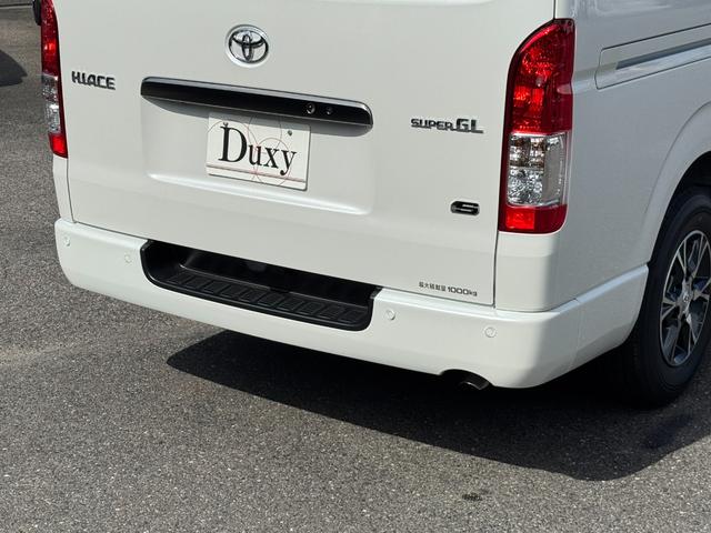 ハイエースバン ロングスーパーGL ダークプライムS 純正アルミホール パノラミックビューモニターカメラ デジタルインナーミラー フロントドアスカフプレート LEDヘッド 両側電動パワースライド アクセサリーコンセント フェンダーミラー 特別仕様車(21枚目)