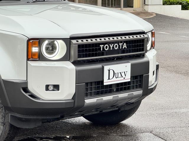 ランドクルーザー２５０ ＶＸファーストエディション　丸目ヘッドライト　ムーンルーフ　デジタルインナーミラー　ブラインドスポットモニタ　パノラミックビューモニター　フルセグＴＶ　オートマチックハイビーム　ブラウン内装　シートヒーター＆ベンチレーション（9枚目）