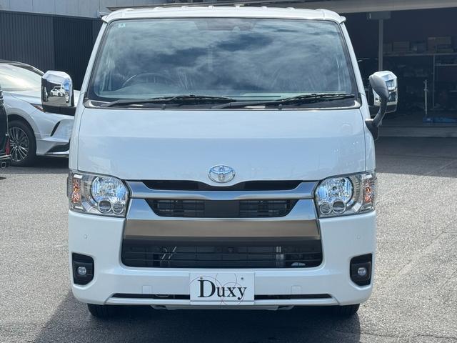 ハイエースバン ロングスーパーGL ダークプライムS 純正アルミホール パノラミックビューモニターカメラ デジタルインナーミラー フロントドアスカフプレート LEDヘッド 両側電動パワースライド アクセサリーコンセント フェンダーミラー 特別仕様車(8枚目)