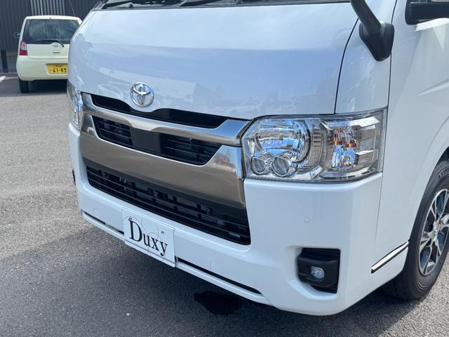 ハイエースバン ロングスーパーGL ダークプライムS 純正アルミホール パノラミックビューモニターカメラ デジタルインナーミラー フロントドアスカフプレート LEDヘッド 両側電動パワースライド アクセサリーコンセント フェンダーミラー 特別仕様車(12枚目)