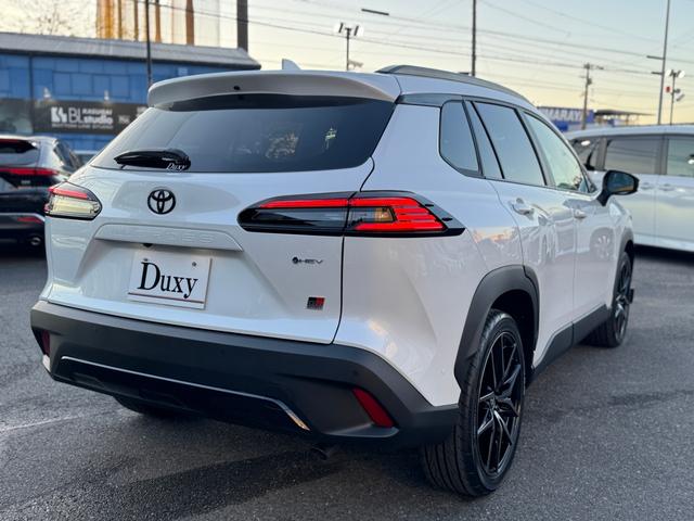 カローラクロス ＧＲスポーツ　登録済未使用車　電動リアゲート　パノラマルーフ　アダプティブハイビーム　ＧＲ専用レッドキャリパー　パノラミックビューモニター　ＢＳＭ　ハンドルヒーター　ナノイーＸ　　アルミペダル　純正１９ＡＷ（18枚目）