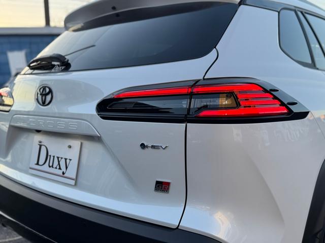 カローラクロス GRスポーツ 登録済未使用車 電動リアゲート パノラマルーフ アダプティブハイビーム GR専用レッドキャリパー パノラミックビューモニター BSM ハンドルヒーター ナノイーX アルミペダル 純正19AW(19枚目)