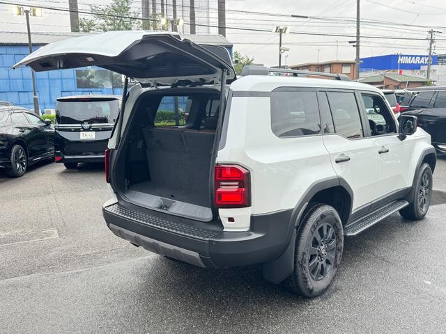 ランドクルーザー250 VXファーストエディション 丸目ヘッドライト ムーンルーフ デジタルインナーミラー ブラインドスポットモニタ パノラミックビューモニター フルセグTV オートマチックハイビーム ブラウン内装 シートヒーター&ベンチレーション(63枚目)