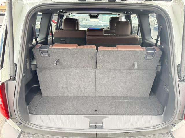 ランドクルーザー250 VXファーストエディション 丸目ヘッドライト ムーンルーフ デジタルインナーミラー ブラインドスポットモニタ パノラミックビューモニター フルセグTV オートマチックハイビーム ブラウン内装 シートヒーター&ベンチレーション(65枚目)