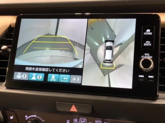 フィット ｅ：ＨＥＶリュクス　Ｈ　ＳＥＮＳＩＮＧ　新車保証　試乗車　ワンオ－ナ－　純正ナビ　ＴＶ　Ｒカメラ　マルチビュ－　ＢＴオ－ディオ　ＥＴＣ　ＬＥＤライト　ＶＳＡ　シ－トヒ－タ－　クルコン　アルミ　スマ－トキ－　盗難防止装置（7枚目）