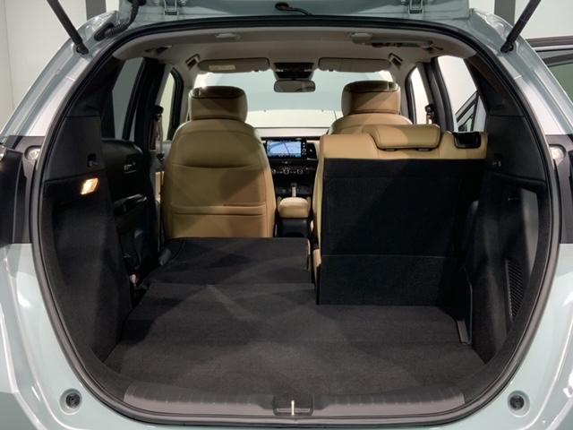 フィット ｅ：ＨＥＶリュクス　Ｈ　ＳＥＮＳＩＮＧ　新車保証　試乗車　ワンオ－ナ－　純正ナビ　ＴＶ　Ｒカメラ　マルチビュ－　ＢＴオ－ディオ　ＥＴＣ　ＬＥＤライト　ＶＳＡ　シ－トヒ－タ－　クルコン　アルミ　スマ－トキ－　盗難防止装置（38枚目）