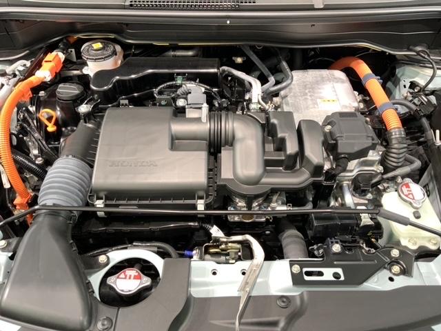 フィット ｅ：ＨＥＶリュクス　Ｈ　ＳＥＮＳＩＮＧ　新車保証　試乗車　ワンオ－ナ－　純正ナビ　ＴＶ　Ｒカメラ　マルチビュ－　ＢＴオ－ディオ　ＥＴＣ　ＬＥＤライト　ＶＳＡ　シ－トヒ－タ－　クルコン　アルミ　スマ－トキ－　盗難防止装置（44枚目）