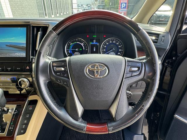 アルファードハイブリッド Ｇ　４ＷＤ　ＥＴＣ　バックカメラ　ナビ　ＴＶ　クリアランスソナー　オートクルーズコントロール　両側電動スライドドア　オートライト　ＬＥＤヘッドランプ　スマートキー　アイドリングストップ　電動格納ミラー（3枚目）