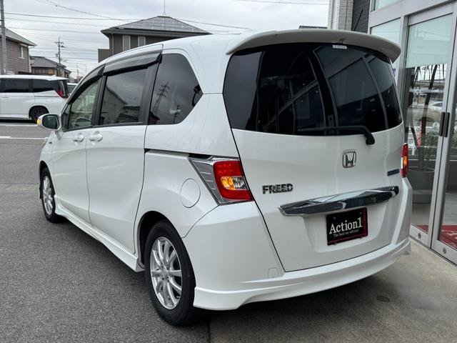 フリードハイブリッド ジャストセレクション　ナビ　ＴＶ　ＥＴＣ　バックカメラ　両側パワースライドドア　ＨＩＤヘッドライト　ＣＤ／ＤＶＤ再生　オートエアコン　オートライト　スマートキー　社外１５インチアルミホイール（8枚目）