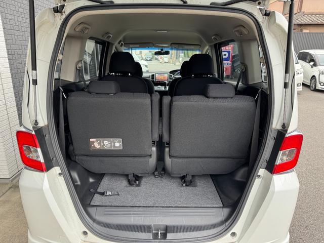 フリードハイブリッド ジャストセレクション　ナビ　ＴＶ　ＥＴＣ　バックカメラ　両側パワースライドドア　ＨＩＤヘッドライト　ＣＤ／ＤＶＤ再生　オートエアコン　オートライト　スマートキー　社外１５インチアルミホイール（18枚目）