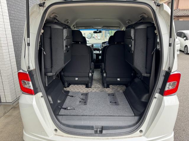 フリードハイブリッド ジャストセレクション　ナビ　ＴＶ　ＥＴＣ　バックカメラ　両側パワースライドドア　ＨＩＤヘッドライト　ＣＤ／ＤＶＤ再生　オートエアコン　オートライト　スマートキー　社外１５インチアルミホイール（20枚目）