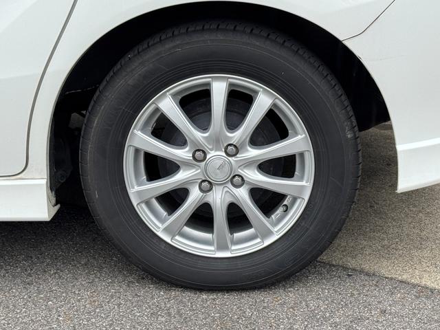 フリードハイブリッド ジャストセレクション　ナビ　ＴＶ　ＥＴＣ　バックカメラ　両側パワースライドドア　ＨＩＤヘッドライト　ＣＤ／ＤＶＤ再生　オートエアコン　オートライト　スマートキー　社外１５インチアルミホイール（23枚目）