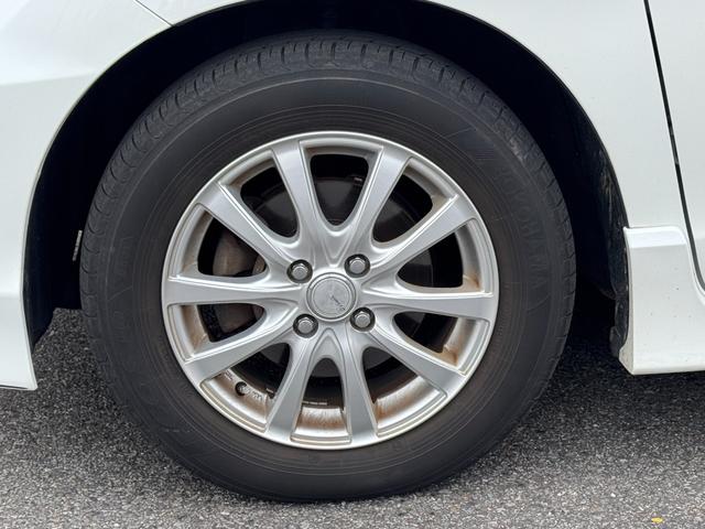 フリードハイブリッド ジャストセレクション　ナビ　ＴＶ　ＥＴＣ　バックカメラ　両側パワースライドドア　ＨＩＤヘッドライト　ＣＤ／ＤＶＤ再生　オートエアコン　オートライト　スマートキー　社外１５インチアルミホイール（24枚目）