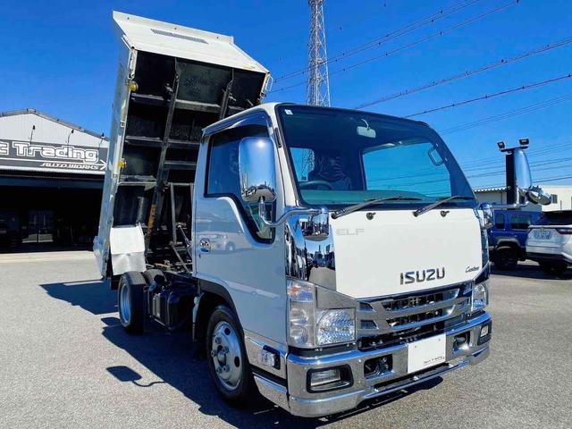 エルフトラック 　ダンプ　低床　ＭＴ　後輪ダブル　キーレスエントリー　電動格納ミラー　ＡＢＳ　エアコン　パワーステアリング　パワーウィンドウ　運転席エアバッグ　助手席エアバッグ　ＣＤ　ＵＳＢ（3枚目）