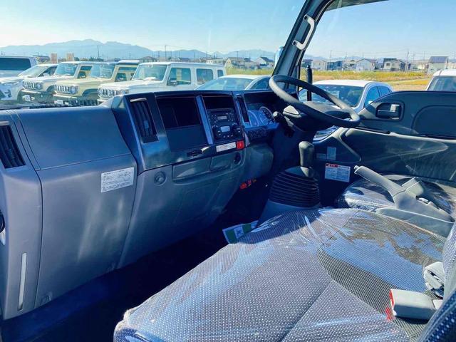 エルフトラック 　ダンプ　低床　ＭＴ　後輪ダブル　キーレスエントリー　電動格納ミラー　ＡＢＳ　エアコン　パワーステアリング　パワーウィンドウ　運転席エアバッグ　助手席エアバッグ　ＣＤ　ＵＳＢ（34枚目）