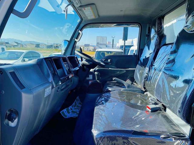 エルフトラック 　ダンプ　低床　ＭＴ　後輪ダブル　キーレスエントリー　電動格納ミラー　ＡＢＳ　エアコン　パワーステアリング　パワーウィンドウ　運転席エアバッグ　助手席エアバッグ　ＣＤ　ＵＳＢ（36枚目）