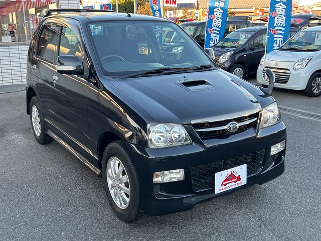 テリオスキッド カスタム　メモリアルエディション　ＥＴＣ　キーレスエントリー　電動格納ミラー　ＡＴ　ＣＤ　アルミホイール　衝突安全ボディ　エアコン　パワーステアリング　パワーウィンドウ（14枚目）