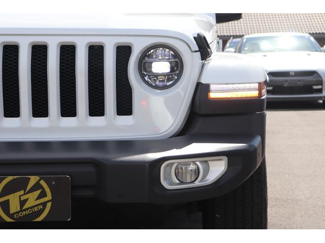 ジープ・ラングラーアンリミテッド サハラ　４ＷＤ　ワンオーナー　革シート　シートヒーター　バックカメラ　クリアランスソナー　オートクルーズコントロール　衝突被害軽減システム　ナビ　ＴＶ　オートライト　ＬＥＤヘッドランプ　アルミホイール（61枚目）