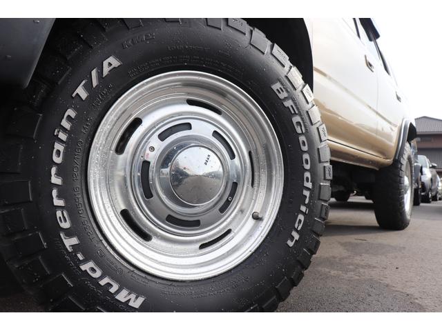 ハイラックスサーフ ＳＳＲ－Ｘ　ワイド　４ＷＤ　ＥＴＣ　バックカメラ　サンルーフ　ＡＴ　ＣＤ　ＡＢＳ　エアコン　パワーステアリング　パワーウィンドウ　革調シートカバー　バグガード（52枚目）