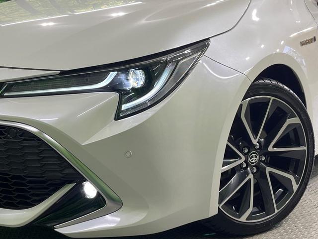カローラスポーツ ハイブリッドＧ　Ｚ　純正９型ナビ　禁煙車　衝突軽減装置　バックカメラ　ＥＴＣ　クリアランスソナー　ＬＥＤヘッドライト　ＬＥＤフロントフォグ　フルセグ　Ｂｌｕｅｔｏｏｔｈ再生　スマートキー　オートライト（12枚目）