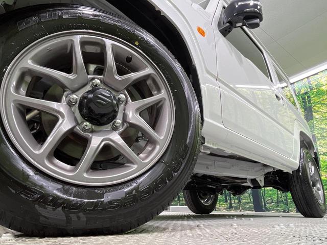 ジムニー XC 禁煙車 4WD MT車 前席シートヒーター コーナーセンサー スマートキー LEDヘッド クルーズコントロール オートライト オートエアコン 純正16インチアルミホイール(12枚目)