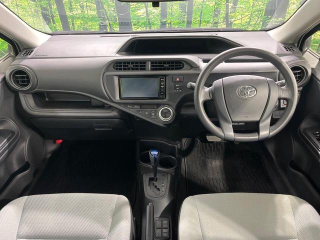 アクア L 禁煙車 純正ナビ Bluetooth ビルトインETC オートエアコン アイドリングストップ キーレスエントリー(2枚目)