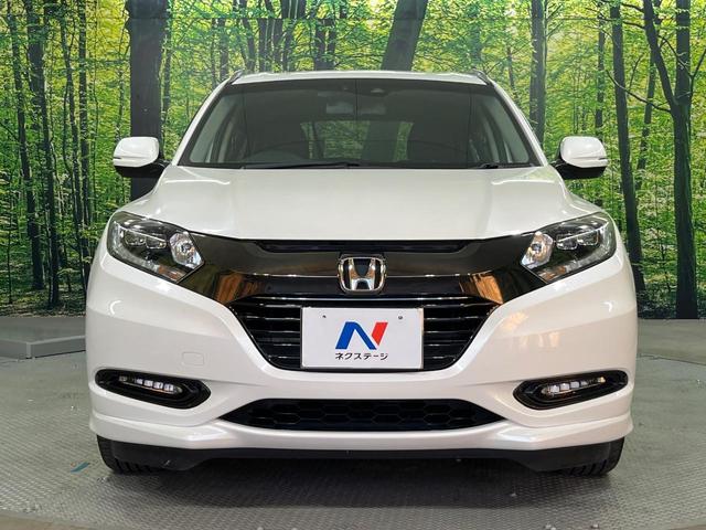 ヴェゼル ハイブリッドZ・ホンダセンシング 禁煙車 純正ナビ バックモニター シートヒーター アダプティブクルーズ 衝突軽減装置 LEDヘッドライト オートライト スマートキー パドルシフト ドライブレコーダー Bluetooth接続(14枚目)