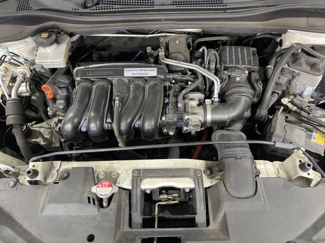 ヴェゼル ハイブリッドZ・ホンダセンシング 禁煙車 純正ナビ バックモニター シートヒーター アダプティブクルーズ 衝突軽減装置 LEDヘッドライト オートライト スマートキー パドルシフト ドライブレコーダー Bluetooth接続(18枚目)